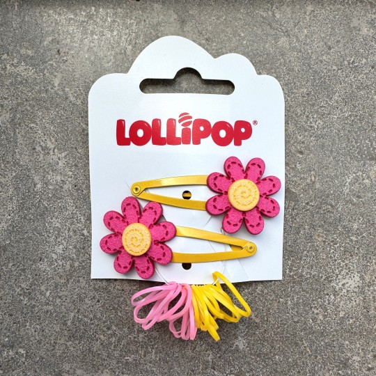 Hårspännen med blomma och minisnoddar