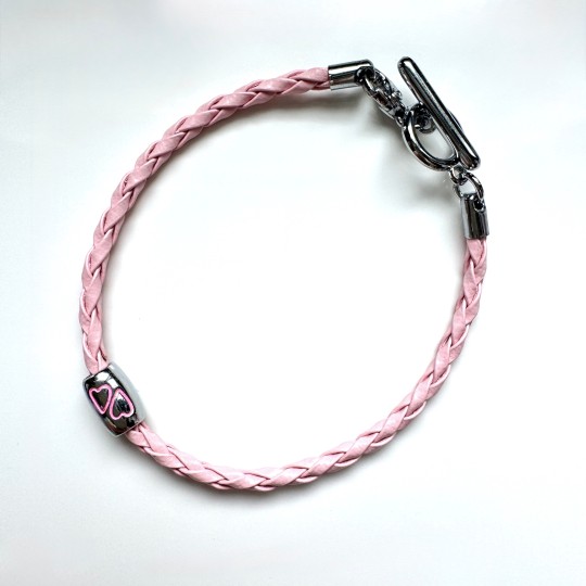 Armband rosa flätat med berlock hjärtan